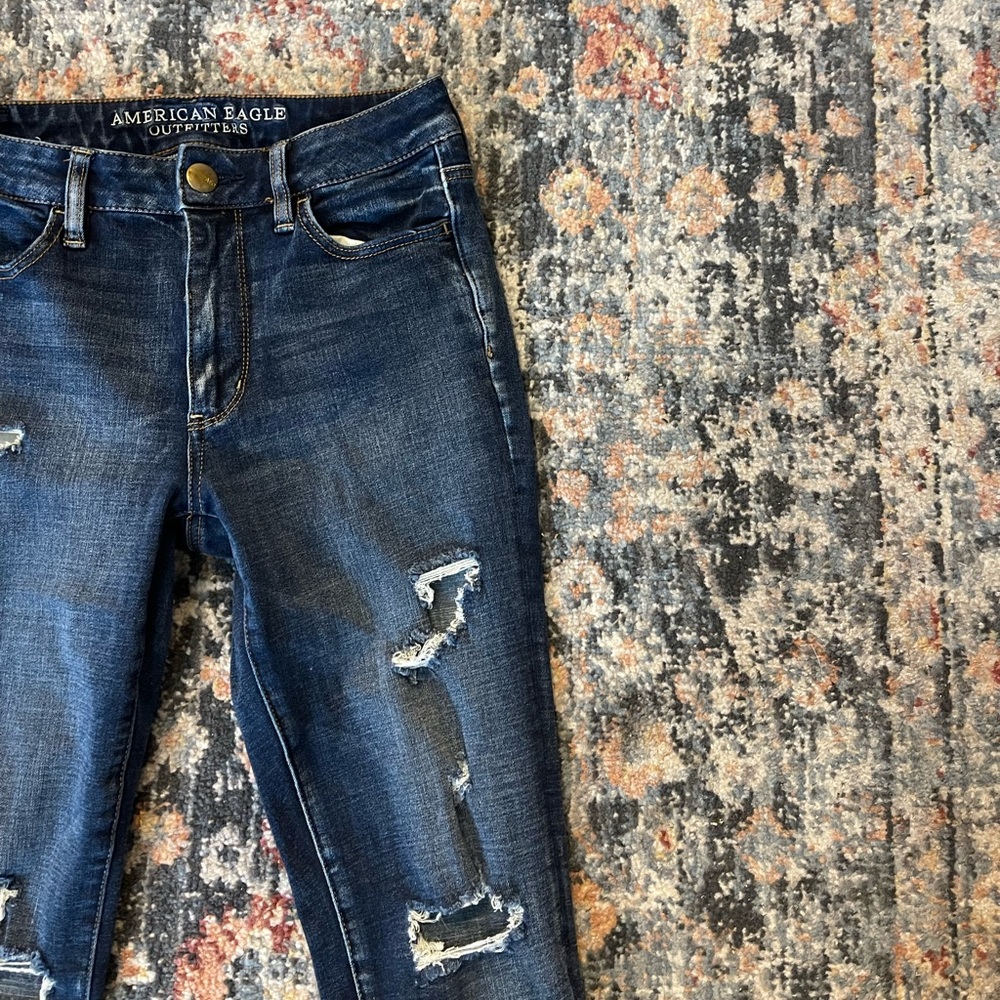 Dark wash ripped skinny jeans